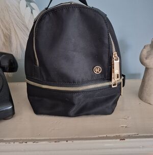 lululemon athletica Black Mini Backpack with Gold Hardware